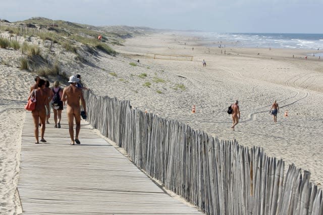 naked beach walkers