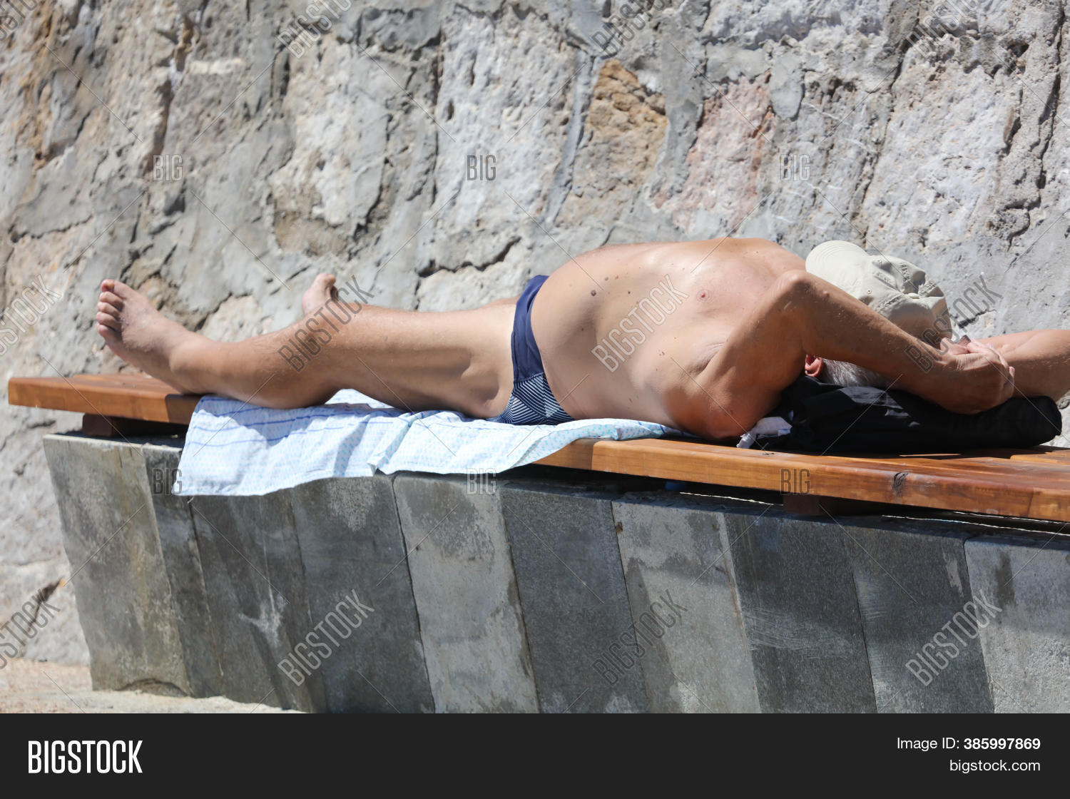 naked men sunbathing